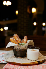sweet deep-fried sticks with milk