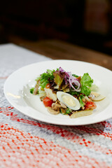 fresh greek salad with egg and vegetables