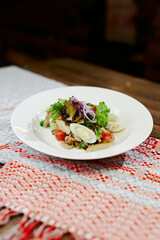 fresh greek salad with egg and vegetables