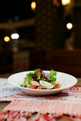 fresh greek salad with egg and vegetables