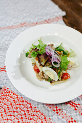 fresh greek salad with egg and vegetables