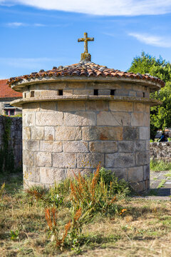 Rounded stone dovecot near Lira horreo in Galicia, Spain