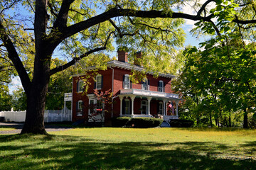 Beautiful red brick Georgian Revival house with large yard in a green neighborhood in Virginia