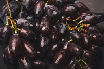 Black grape isolated on Black background
