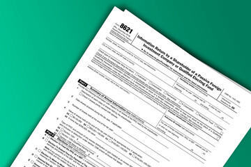 Form 8621 documentation published IRS USA 12.13.2018. American tax document on colored