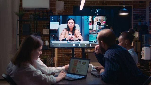 Business team online meeting, remote coworkers videocall discussion. Diverse people talking in teleconference, colleagues brainstorming in videoconference in office zoom in