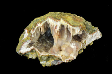 Quartz geode with chalcedony stalactite forms covered with quartz crystals.
Origin: Sidi Rahal, Marocco.
