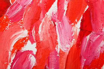 Beautiful strokes of bright oil paints on white canvas as background, closeup
