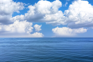 Obraz premium Beautiful view of seascape and blue sky with white clouds on sunny day