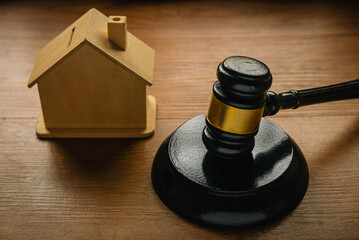 Concept of real estate auction, legal system and property division after divorce. Gavel and house...
