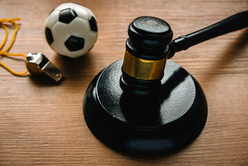 Law and soccer sport.Football coach accused. Concussion lawsuit.
