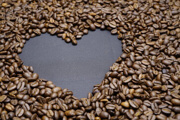 Heart with perfect roasted coffee beans image of love and passion for coffee