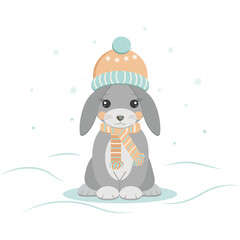 rabbit in a hat and scarf it is cold winter has begun snowflakes are falling