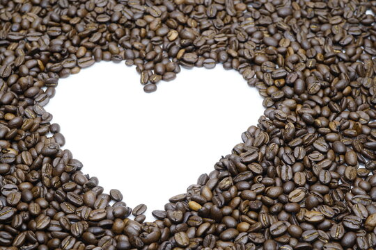 White heart with perfect roasted coffee beans image of love and passion for coffee