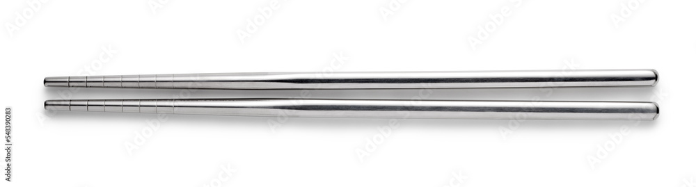 Wall mural Silver metal chopsticks isolated on white background. Top view.