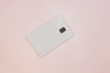 Photo mock-up of white credit card on pink background