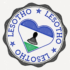 Lesotho heart flag logo. Country name text around Lesotho flag in a shape of heart. Cool vector illustration.