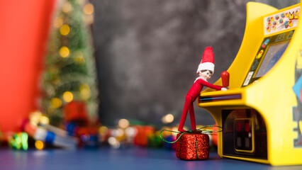 Elf playing a video game.