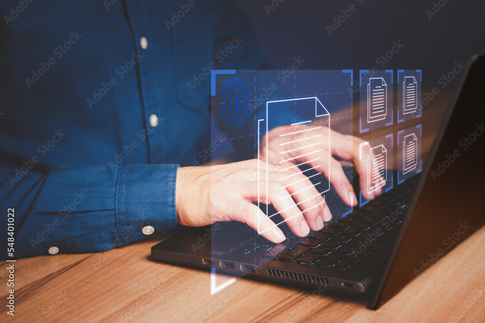 Fototapete Document Management System (DMS), online documentation database and process automation to efficiently manage files. Corporate business technology. Employee man using a computer laptop in office.