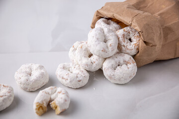 Powdered sugar mini donuts from a bag- carnival or summer fair food