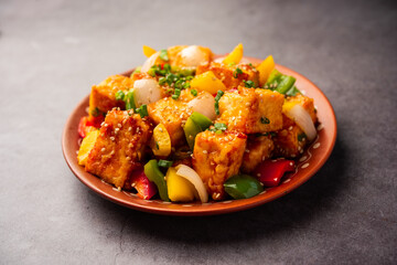 chilli paneer dry is made using cottage cheese, Indo chinese food