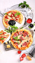 Freshly baked pizza on dark background.