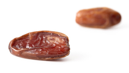 Dried dates isolated on white background.