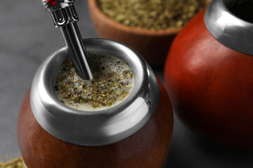 Calabash with mate tea and bombilla, closeup