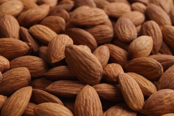 Pile of delicious raw ripe almonds, closeup
