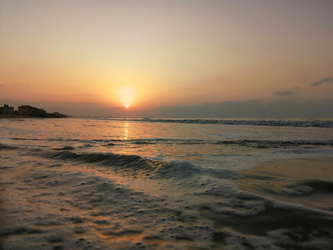 landscape photography of a beautiful sunset at seaview beach, Karachi, Pakistan. Perfect photograph of a sunset at sea.