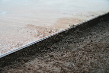 white tile and cement floor, construction industry