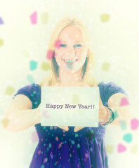 Atrractive blonde girl holding Happy New Year  card