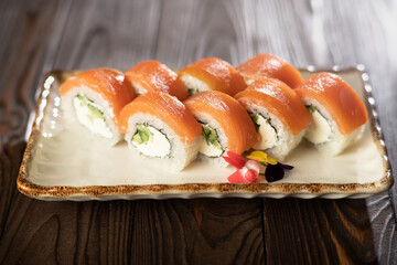 Sushi set philadelphia with cheese and salmon on plate