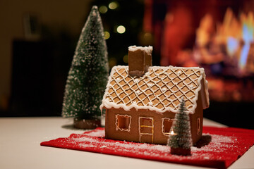 Naklejka na ściany i meble Decorated christmas gingerbread house in homely cozy atmosphere.