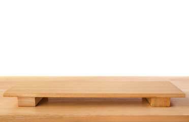 Empty sushi board on wood table with white background. Top view of plank wood for graphic stand product, interior design or montage display your product