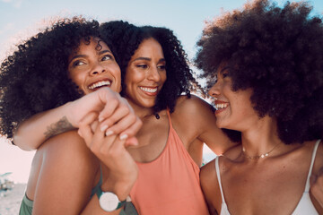 Black women, relax and friends hug at beach, having fun and bonding. Travel, freedom and group of...