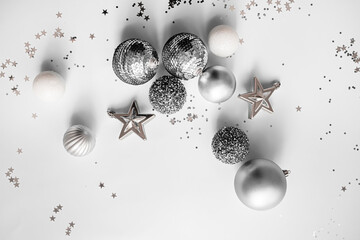 
creative new year layout with silver and white christmas decorations isolated on white background....
