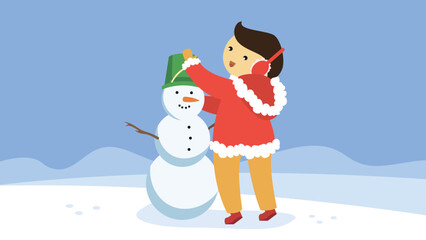 The boy puts a bucket on the snowman's head