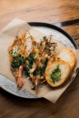 grilled shrimp in garlic sauce with crispy bread
