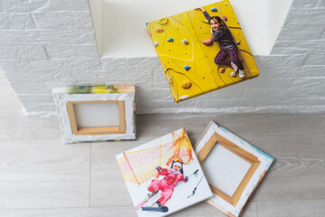 Canvas print. photo with gallery wrap method of canvas stretching on stretcher bar. Sample of stretched color photograph printed on canvas, lateral side, closeup.