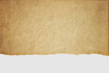 Old brown ripped paper. Vintage background