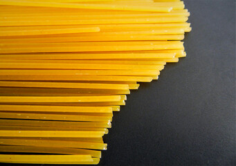 spaghetti pasta on a gray dish, close-up