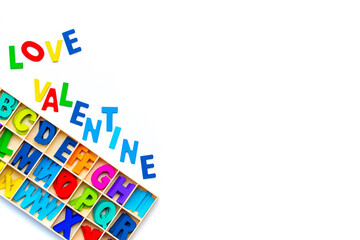 Wood Alphabet letters love valentine on white background. colorful letters toys. english font jigsaw. valentine greeting card copy space for add text message.