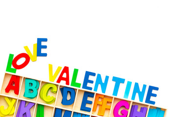 Wood Alphabet letters love valentine on white background. colorful letters toys. english font jigsaw. valentine greeting card copy space for add text message.