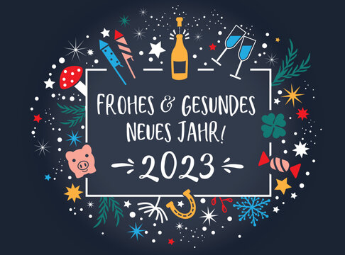 Wir wünschen frohes und gesundes neues Jahr 2023 - Kalligraphie mit bunten Symbolen - deutscher Text auf blauem Hintergrund