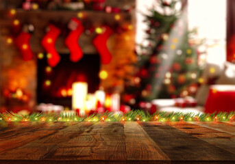 Naklejka na ściany i meble Empty wood table top on blurry bokeh Christmas tree and news year decoration. Concept Christmas time for web banner , display or montage your products. Warm colors.