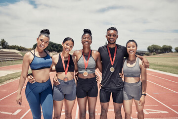 Obraz premium Portrait, diversity and team for sports winner, for competition and group smile together outdoor. Teamwork, fitness training and medals for games, success and victory for embrace, happy and on track.