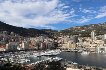Fototapeta na wymiar Monaco, Monaco - 11.19.2022 : View of Port Hercule in Monaco on a sunny day