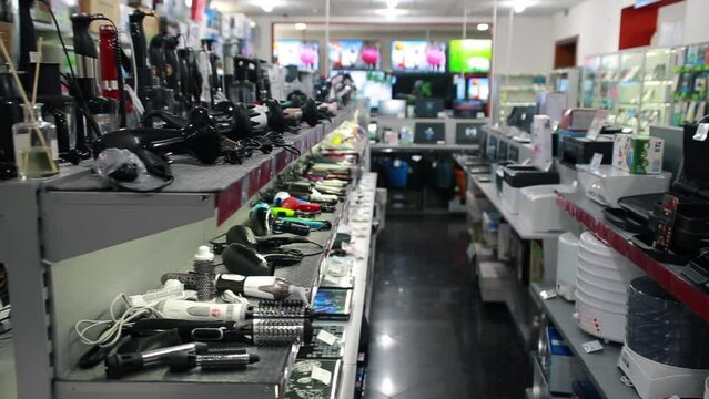 Consumer electronics electrical appliances for the home on the shelves in the store. Trade and Marketing 