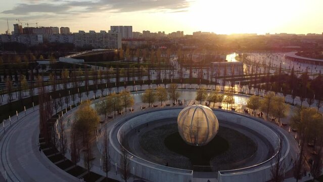 KRASNODAR, RUSSIA - APRIL 20, 2021: Krasnodar Park at sunset from a bird's-eye view. 4K.